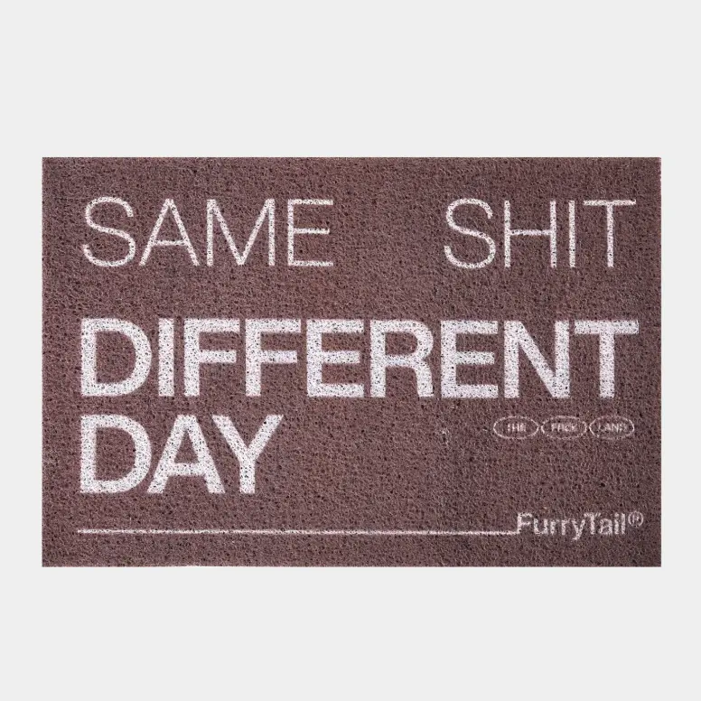 Gray non-slip litter mat with white printed lettering