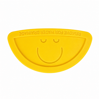 Yellow semicircular drain plug for the Automatic Litter Box Pro